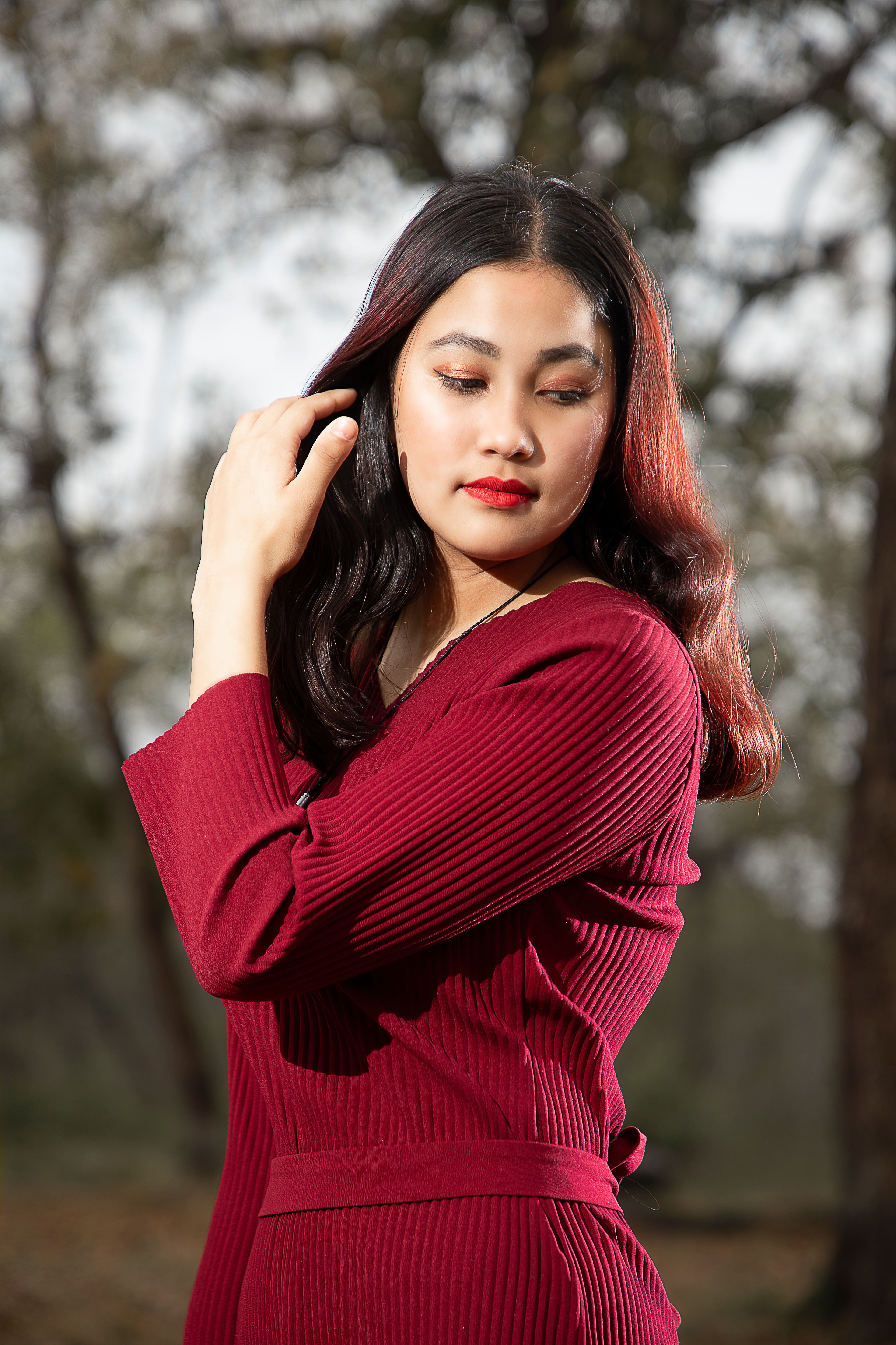 A Woman Wearing a Red Dress · Free Stock Photo