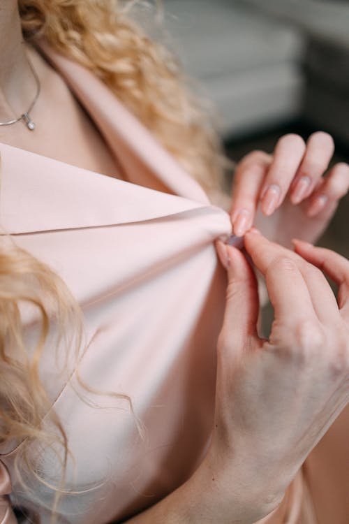 Woman in Beige Button Up Shirt