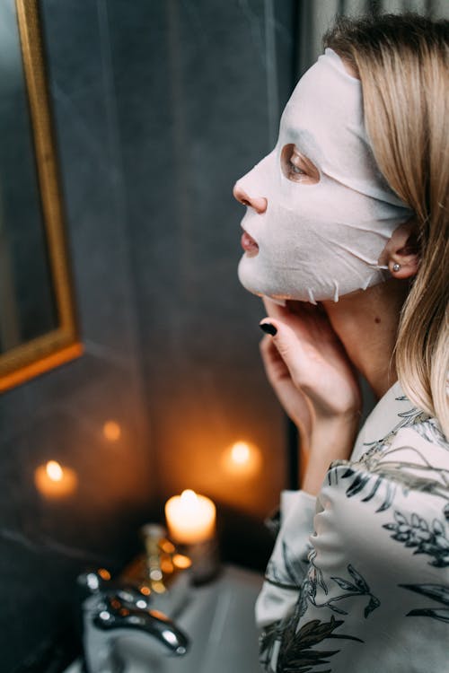 Free A Woman With a Sheet Mask  Stock Photo