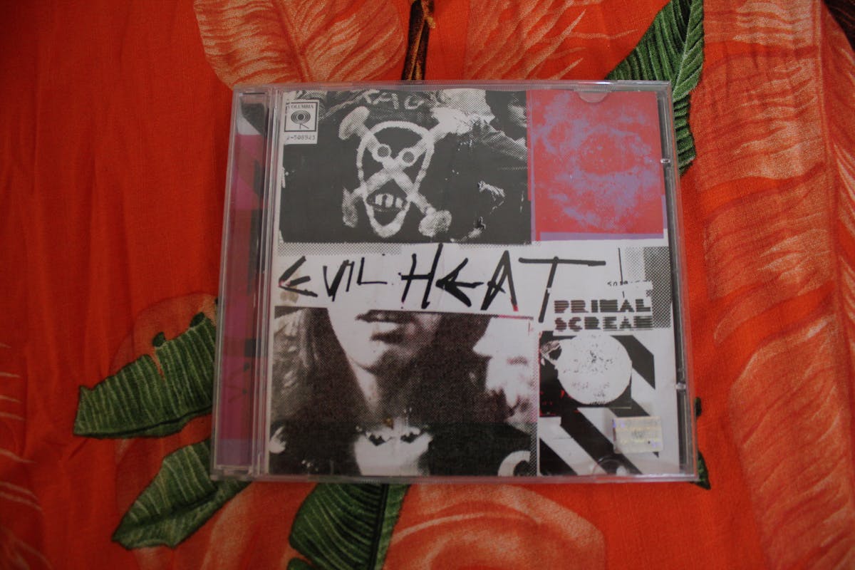 Person listening to music on a smartphone with graphical overlays of blockchain and crypto icons