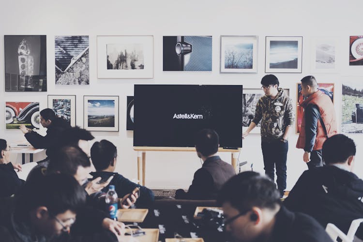 Group Of People In Art Exhibit