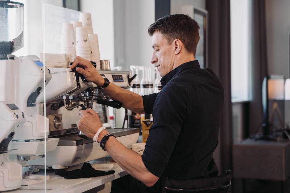 small business health insurance Florida comparison - A barista skillfully making espresso in a contemporary cafe setting.