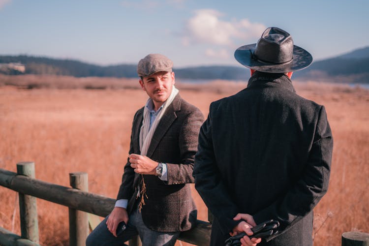 Men In The Countryside Farm Talking