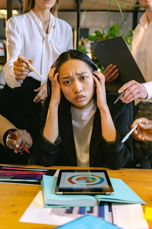 Free Employee Feeling the Pressure in the Office Stock Photo