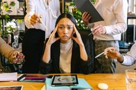 An Employee Feeling the Pressure in the Office
