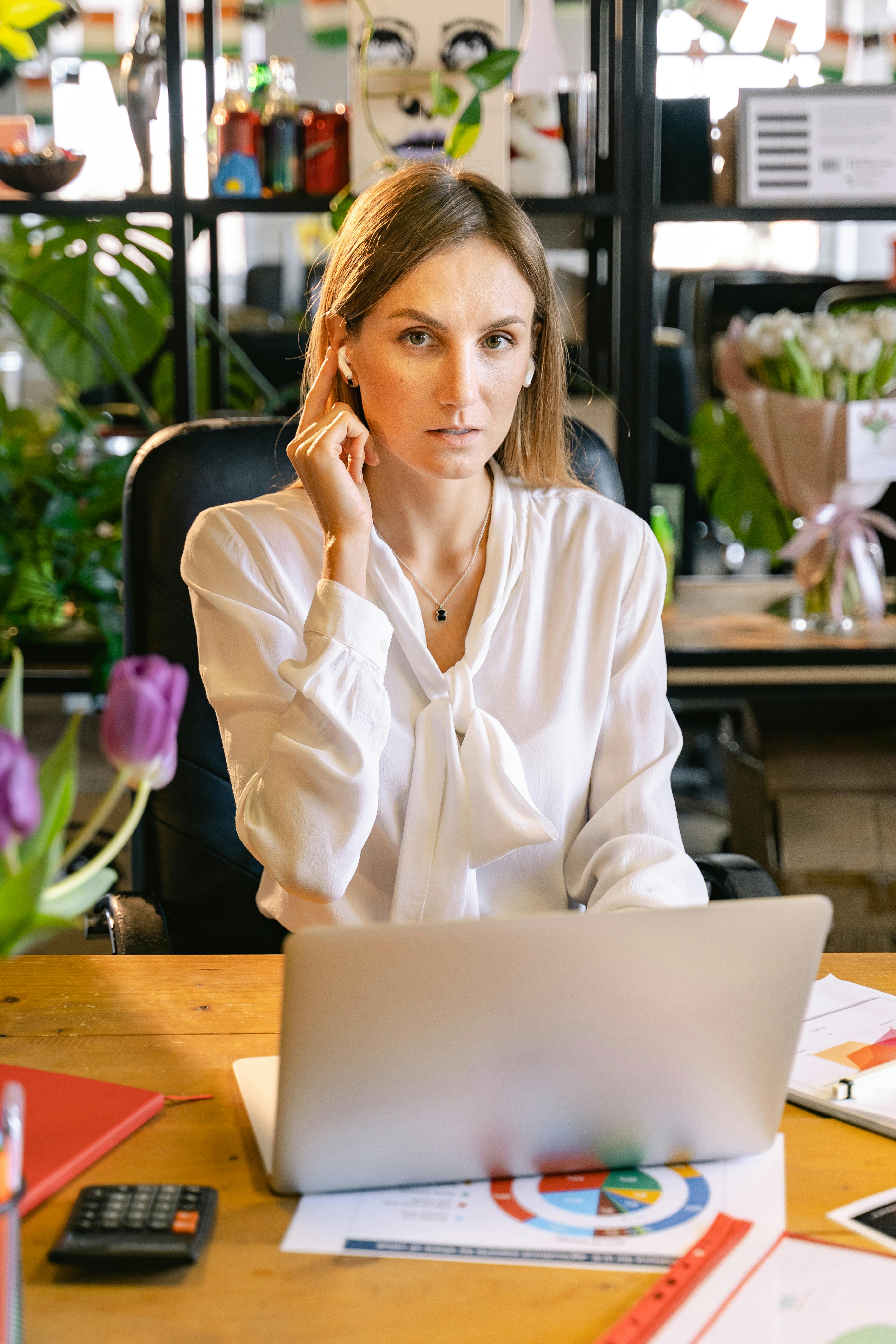 portrait shot of an employee using a laptop