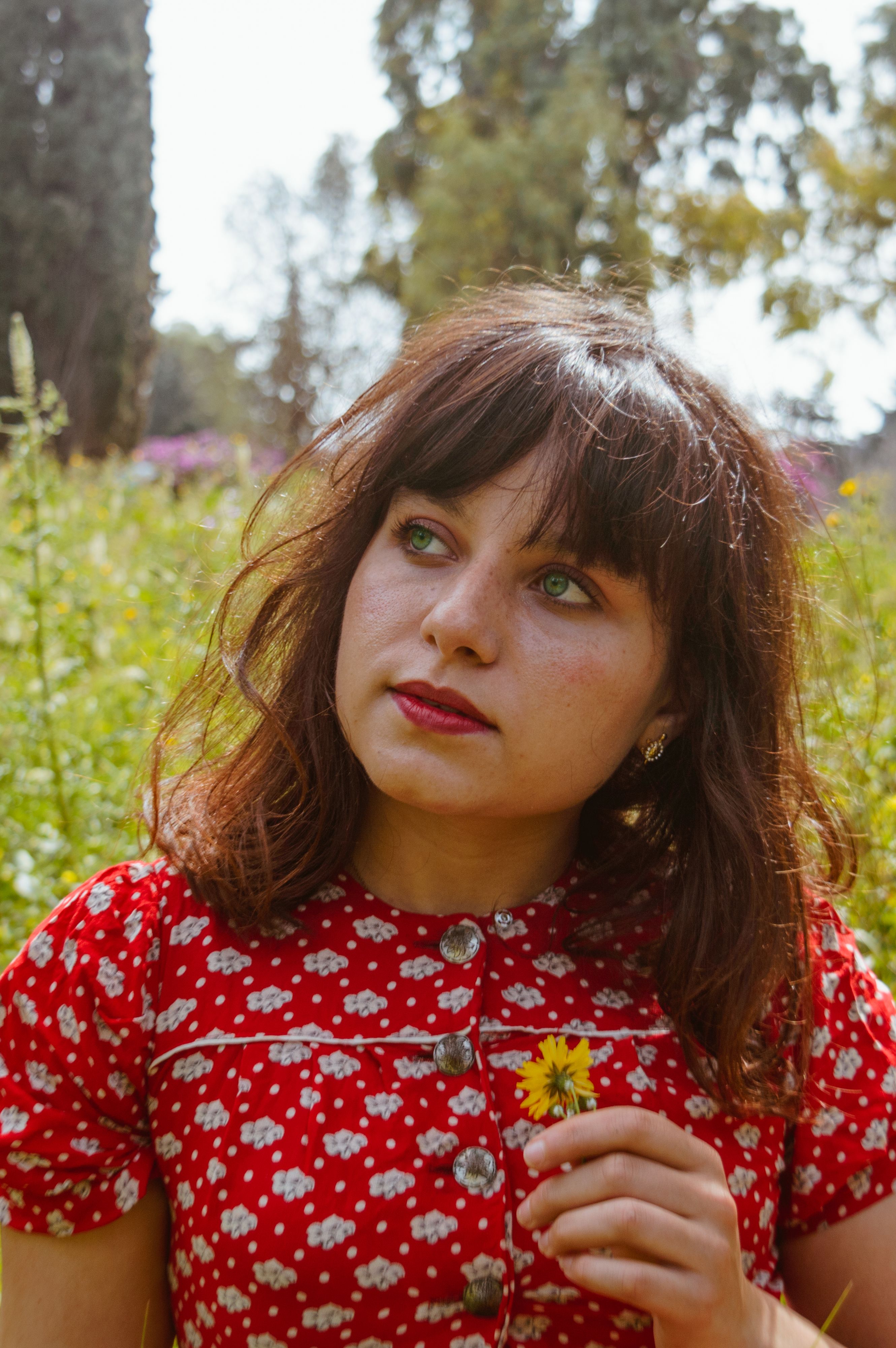 Photo of a Woman Wearing Floral Top · Free Stock Photo