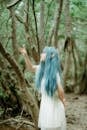 Creative Asian woman elf cosplay in woods