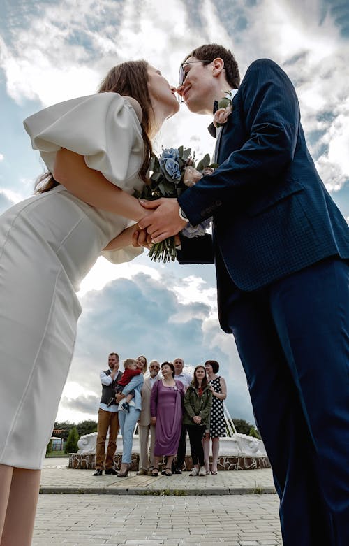 A Newlywed About to Kiss