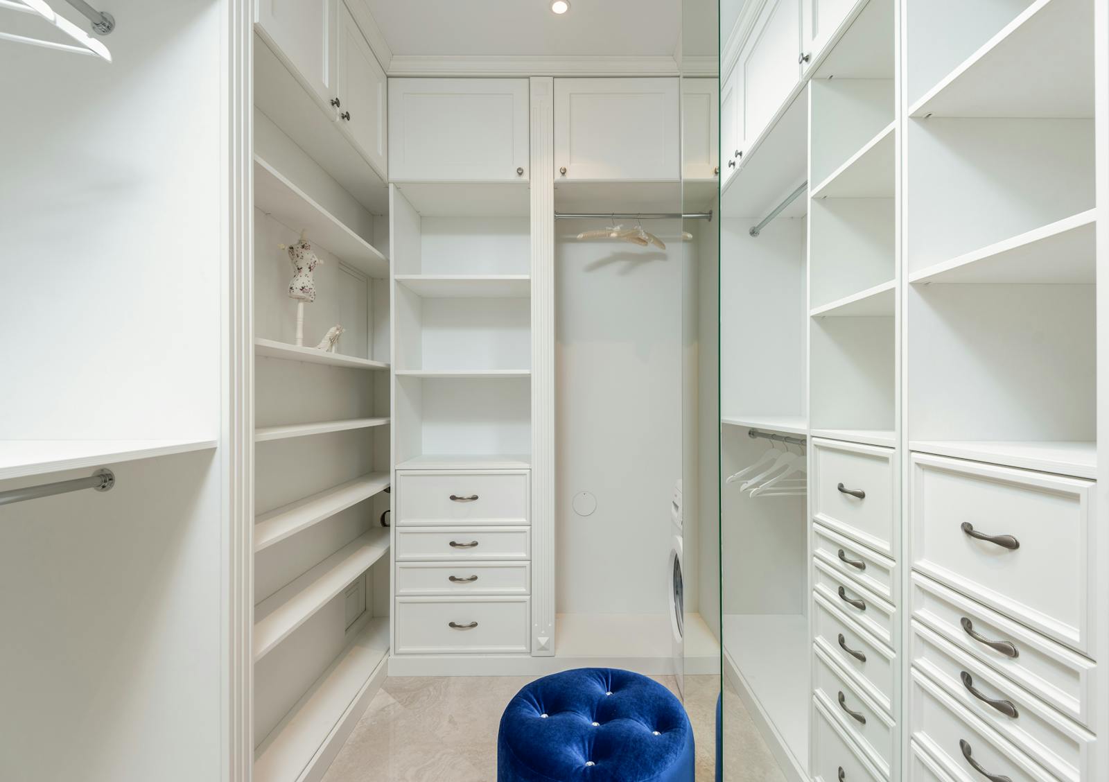 Luxury bedroom walkin closet in a Cranston, Calgary home