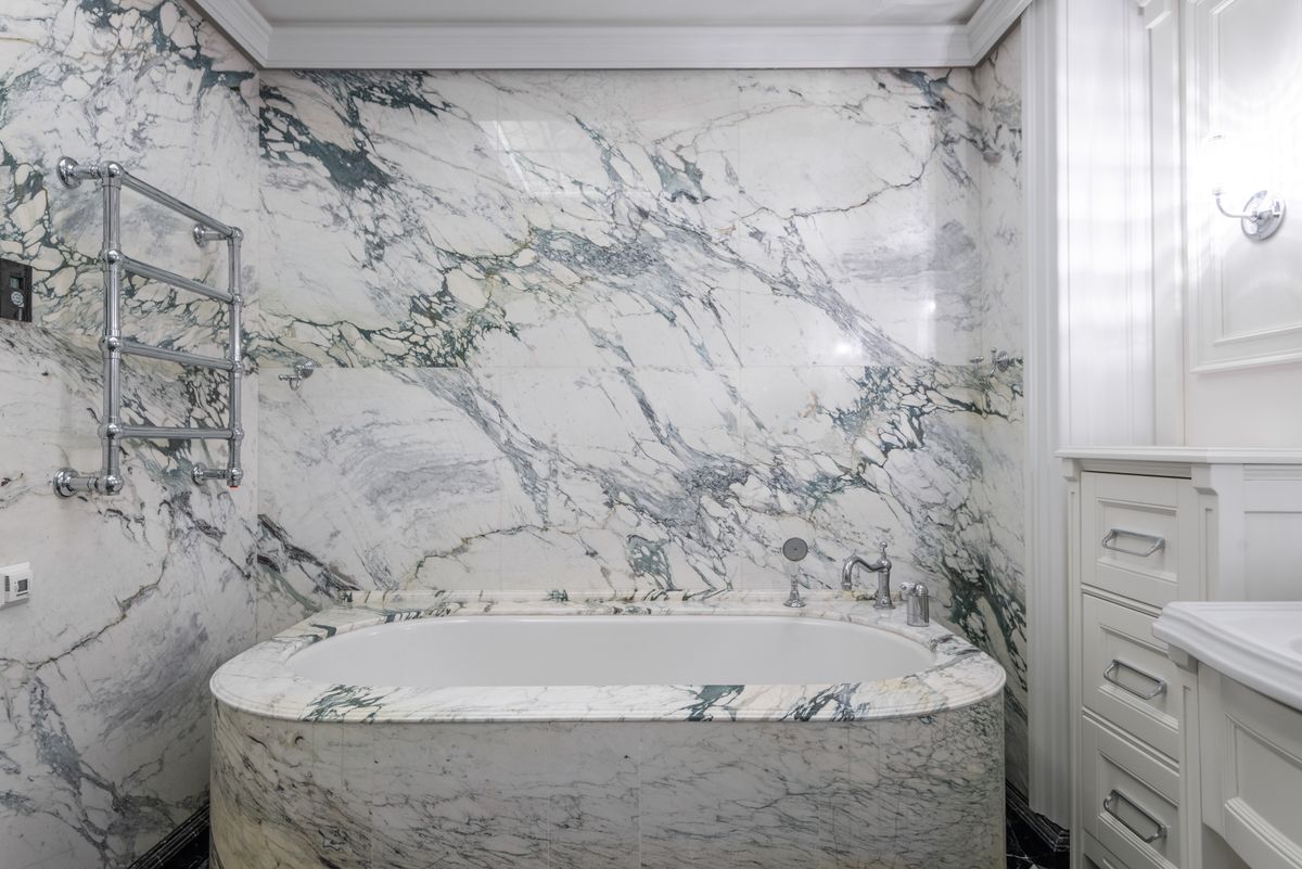 Luxury marble bathroom with freestanding tub