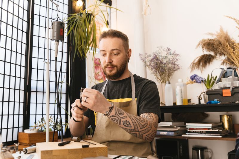 Maker at work in his shop, photo by Adventure Studio on Pexels
