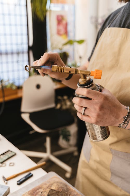 Close-up of Man Crafting a Ring