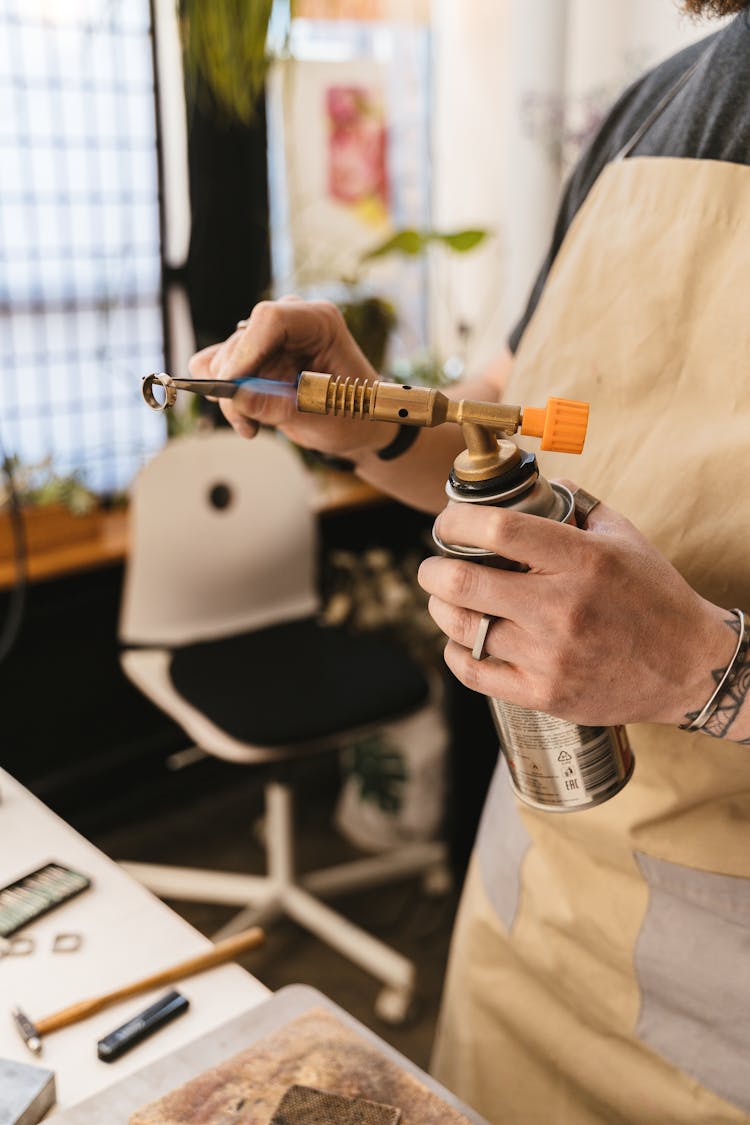 Close-up Of Man Crafting A Ring