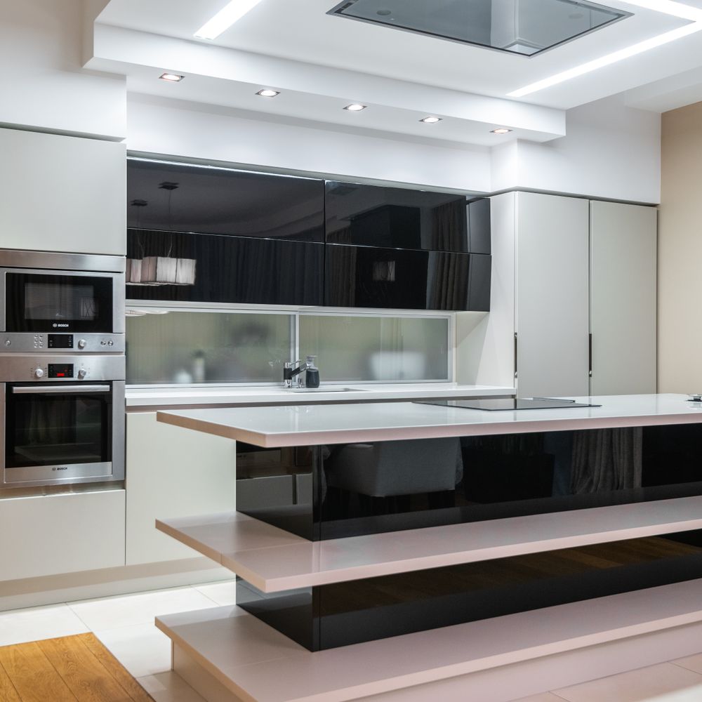 Kitchen Spraying in Oval — careful masking before painting begins