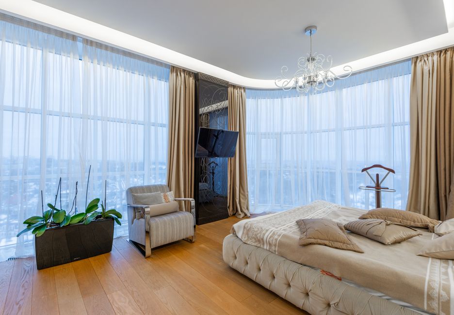 airy minimalist bedroom with high ceiling and tall plants - apartments with high ceilings airy minimalist bedroom with high ceiling and tall plants - apartments with high ceilings