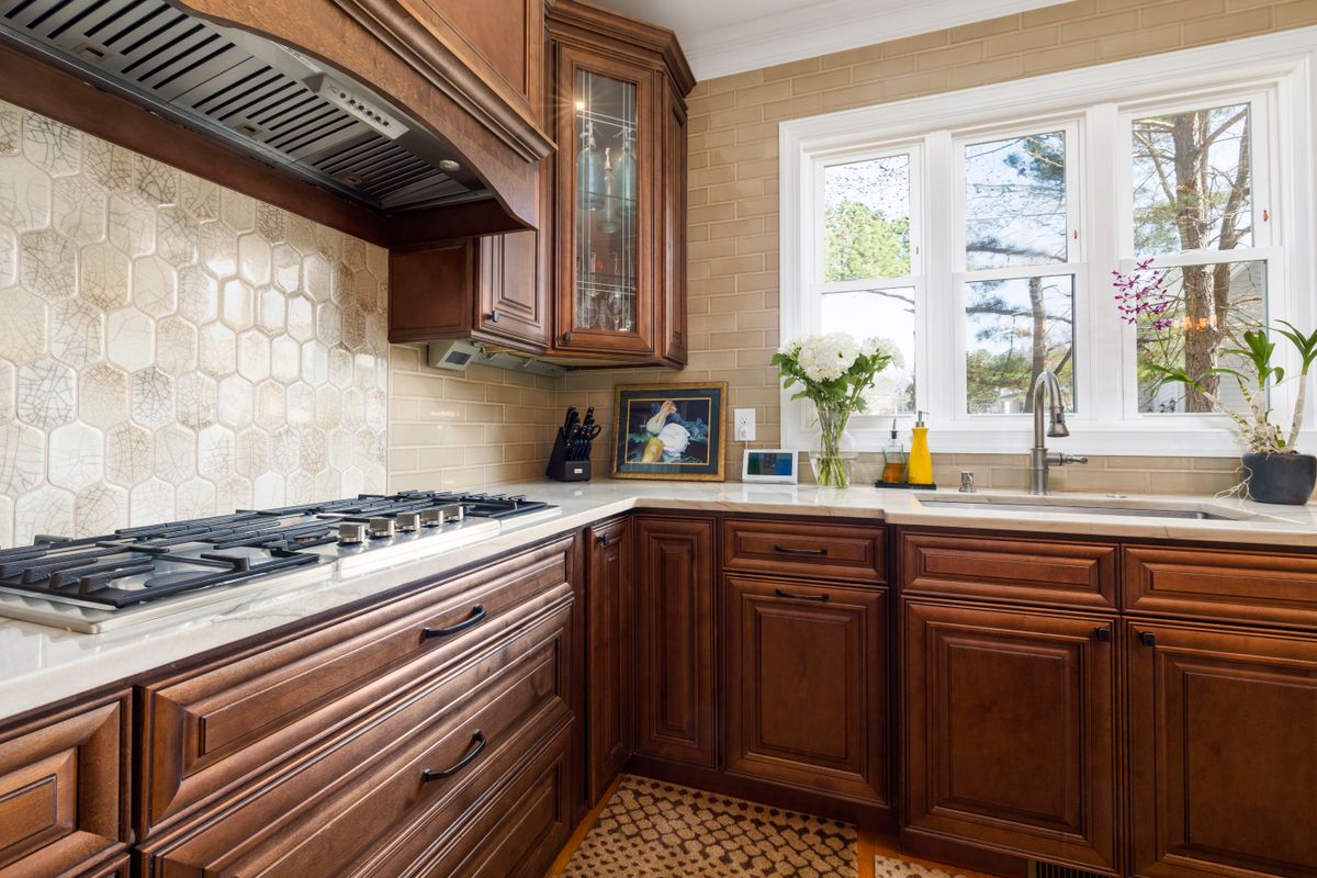 Farmhouse-style kitchen with classic wooden cabinetry