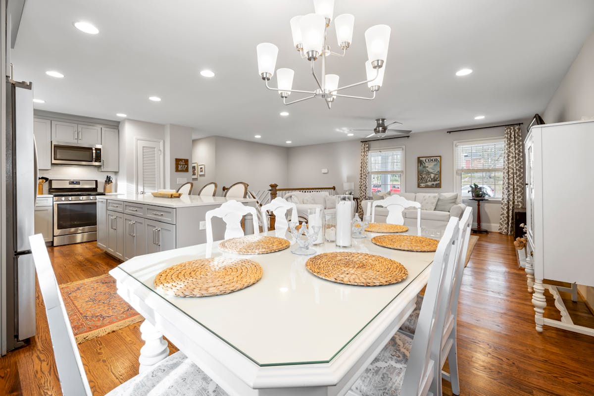 Open plan living space with kitchen and living room showcasing modern renovation work