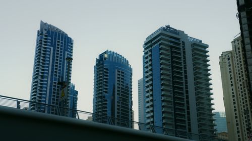 Free View of urban skyscrapers against a clear backdrop, showcasing modern architecture. Stock Photo