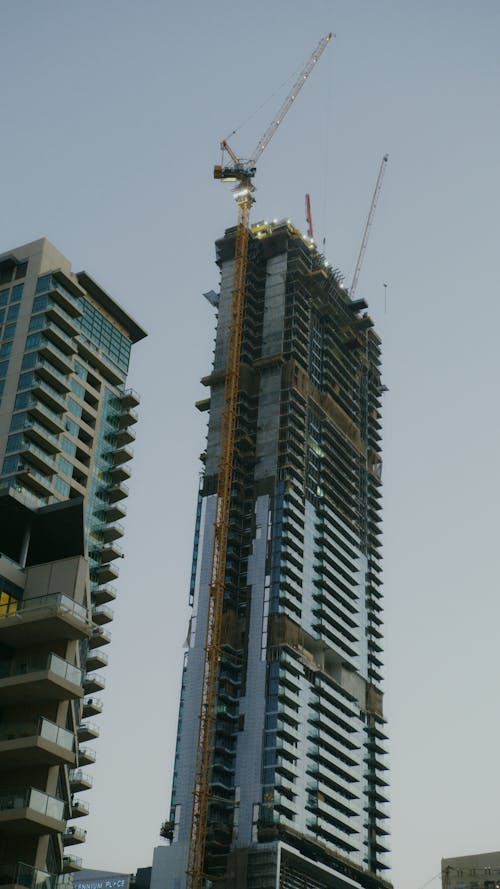 Free Low-Angle Shot of a High Rise Building Under Construction Stock Photo