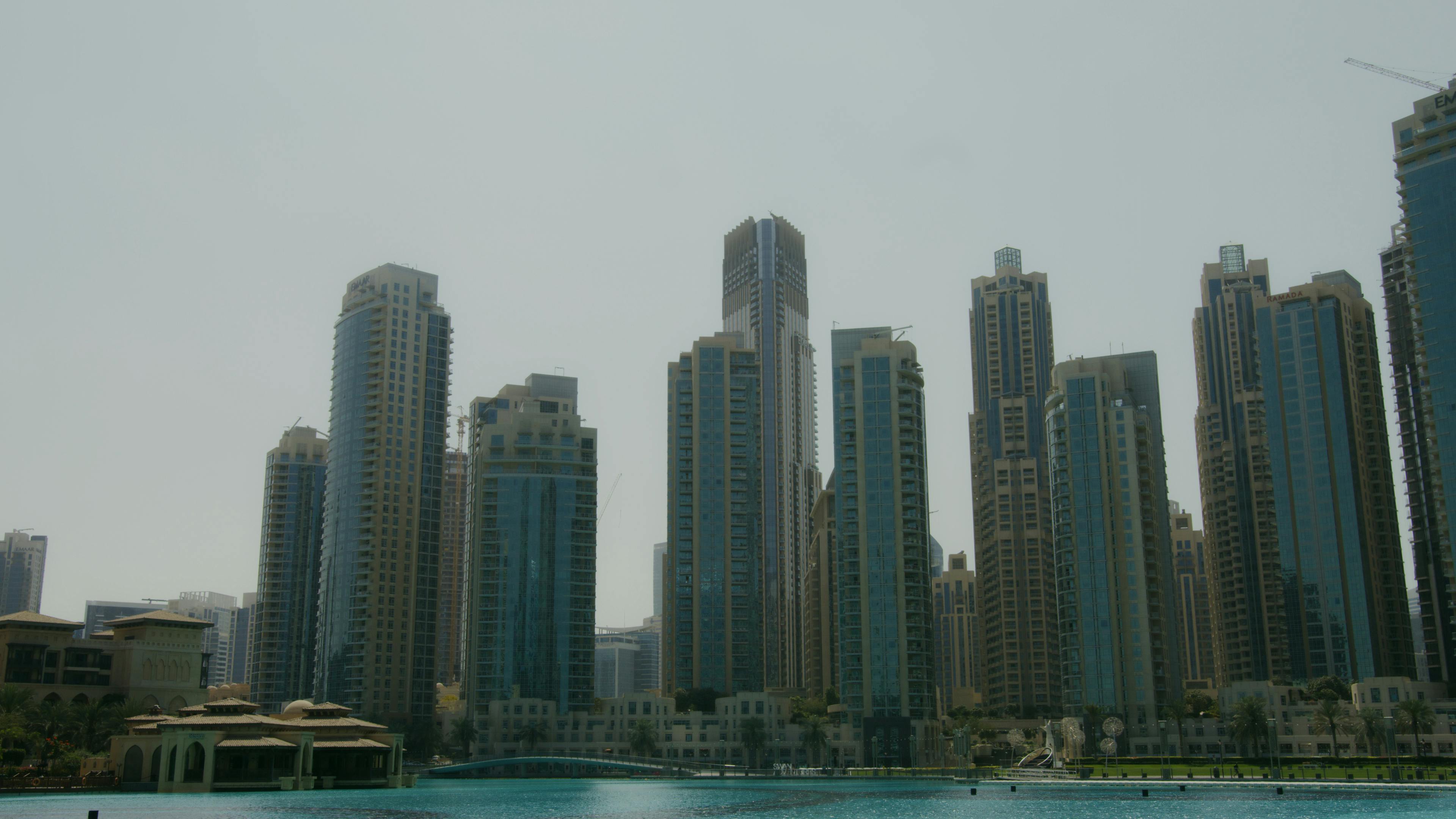 high rise buildings near body of water