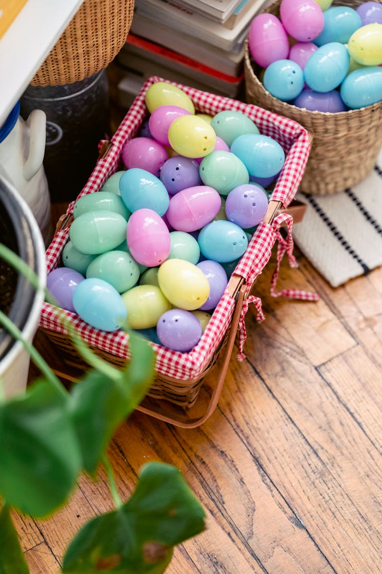 Piles Of Easter Eggs In Basket And Bucket On Floor