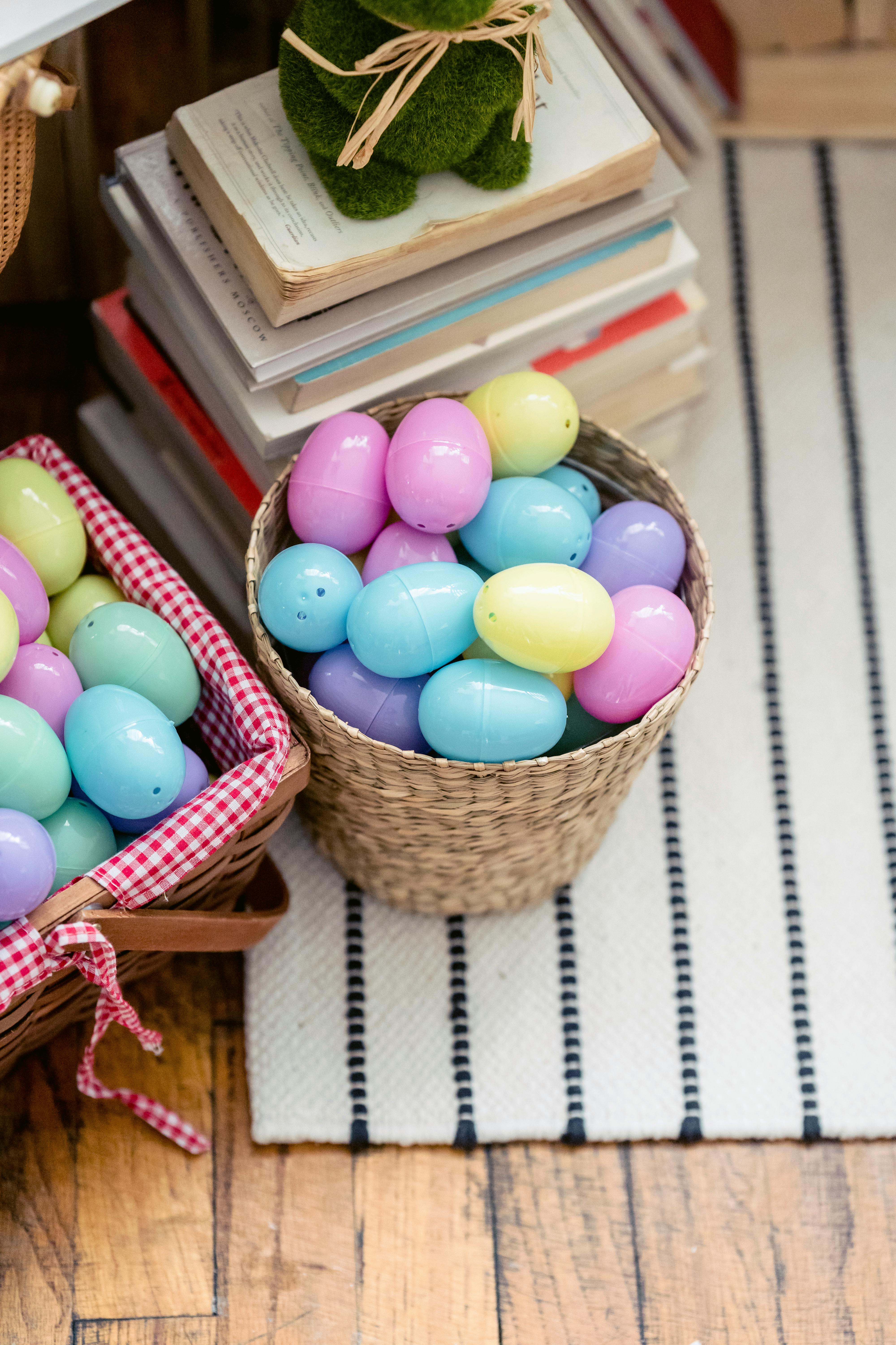 heaps of easter eggs against books at home