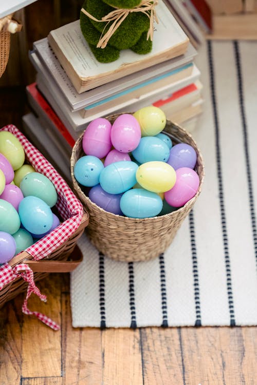 Heaps of Easter eggs against books at home