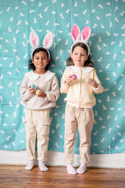 Free Diverse girls in hairbands with rabbit ears during Easter holiday Stock Photo