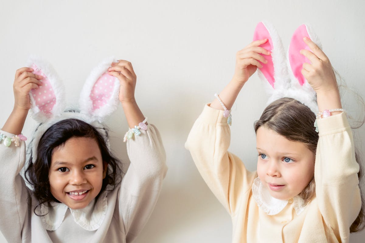 Cute diverse girls wearing bunny ears