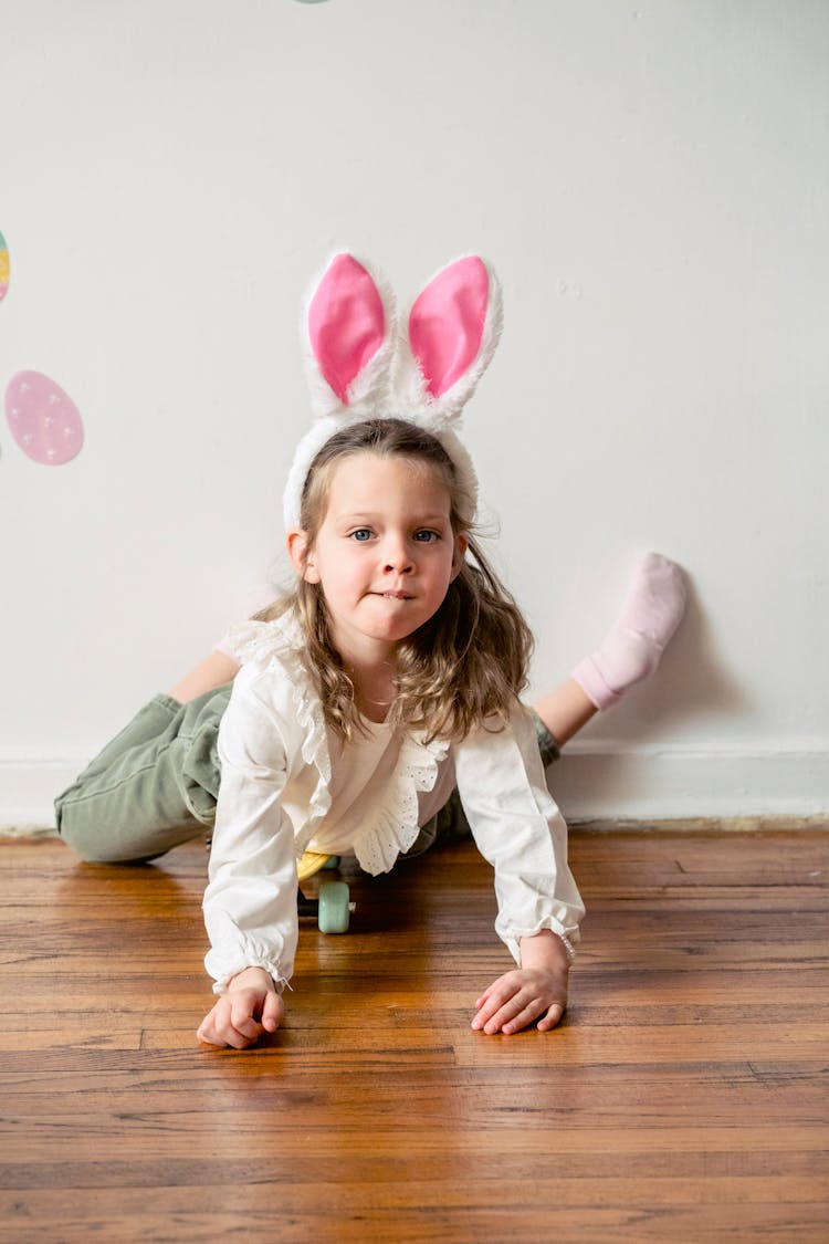 Girl In Bunny Ears Playing At Home