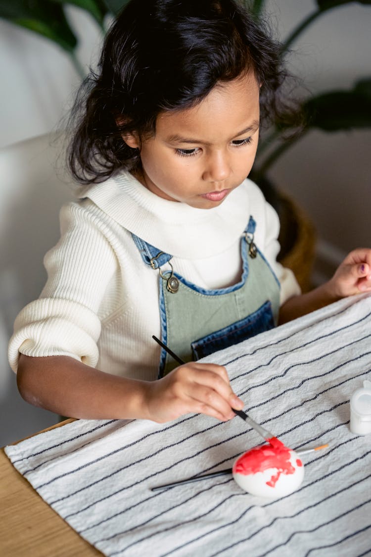 Girl Painting Easter Egg