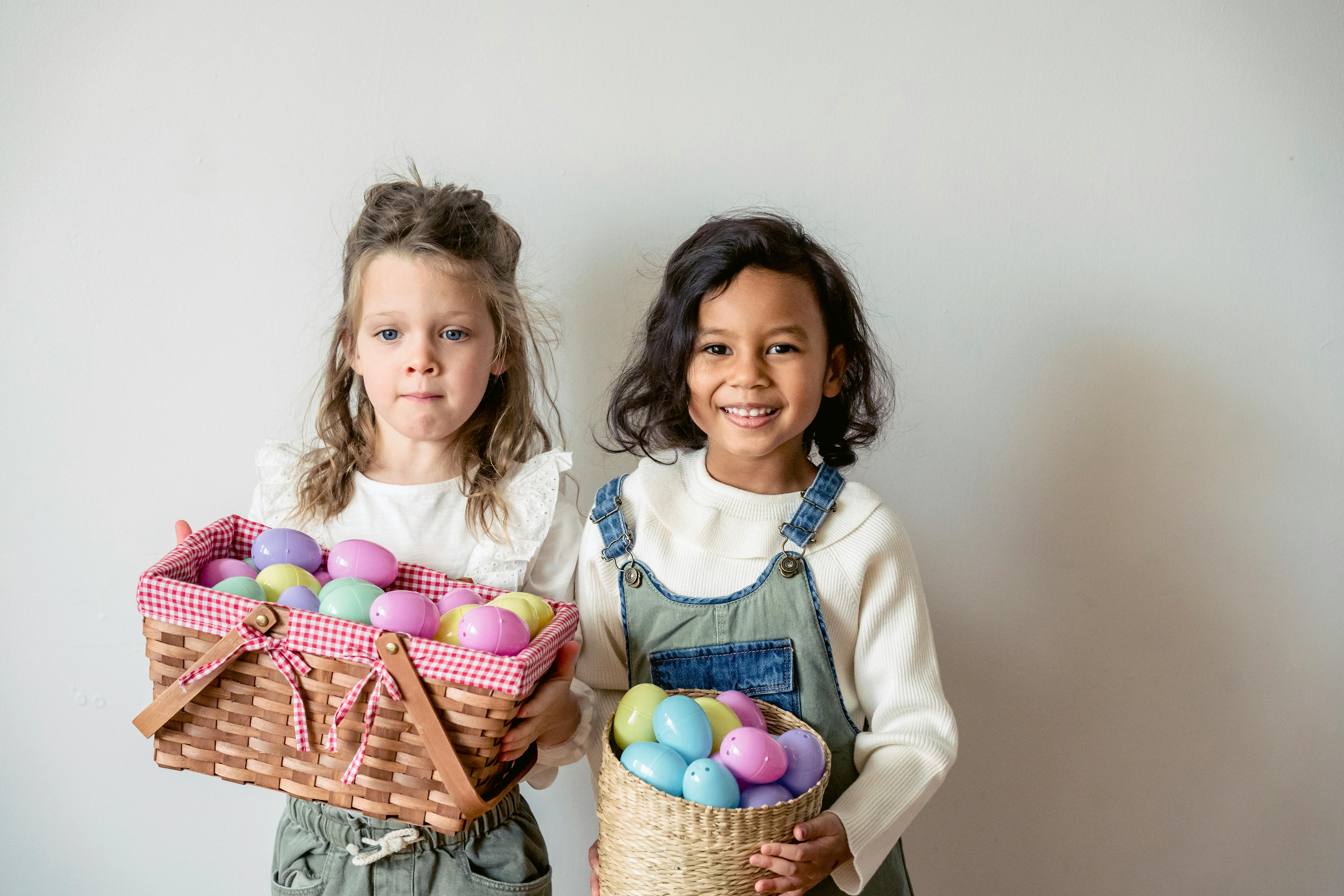 positive multiracial girls with colorful eggs