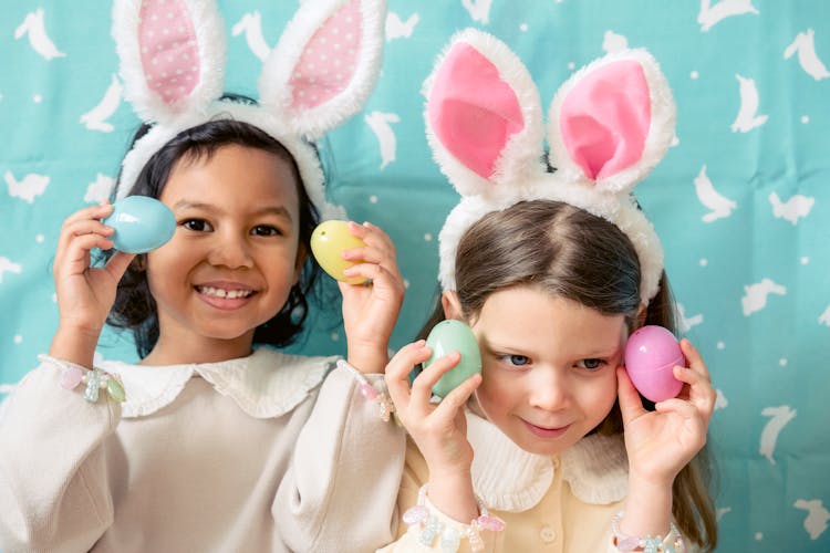 Content Diverse Girls With Plastic Eggs On Easter Day