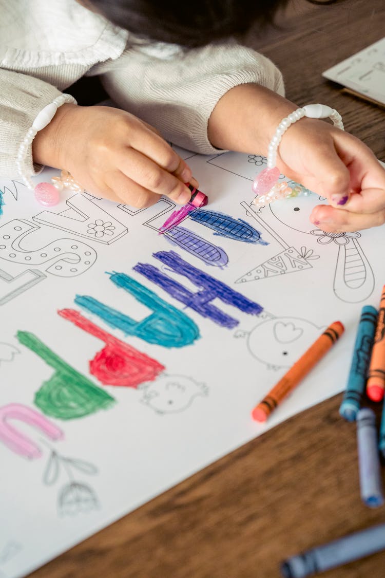 Faceless Girl Coloring Drawing With Crayon On Easter Day