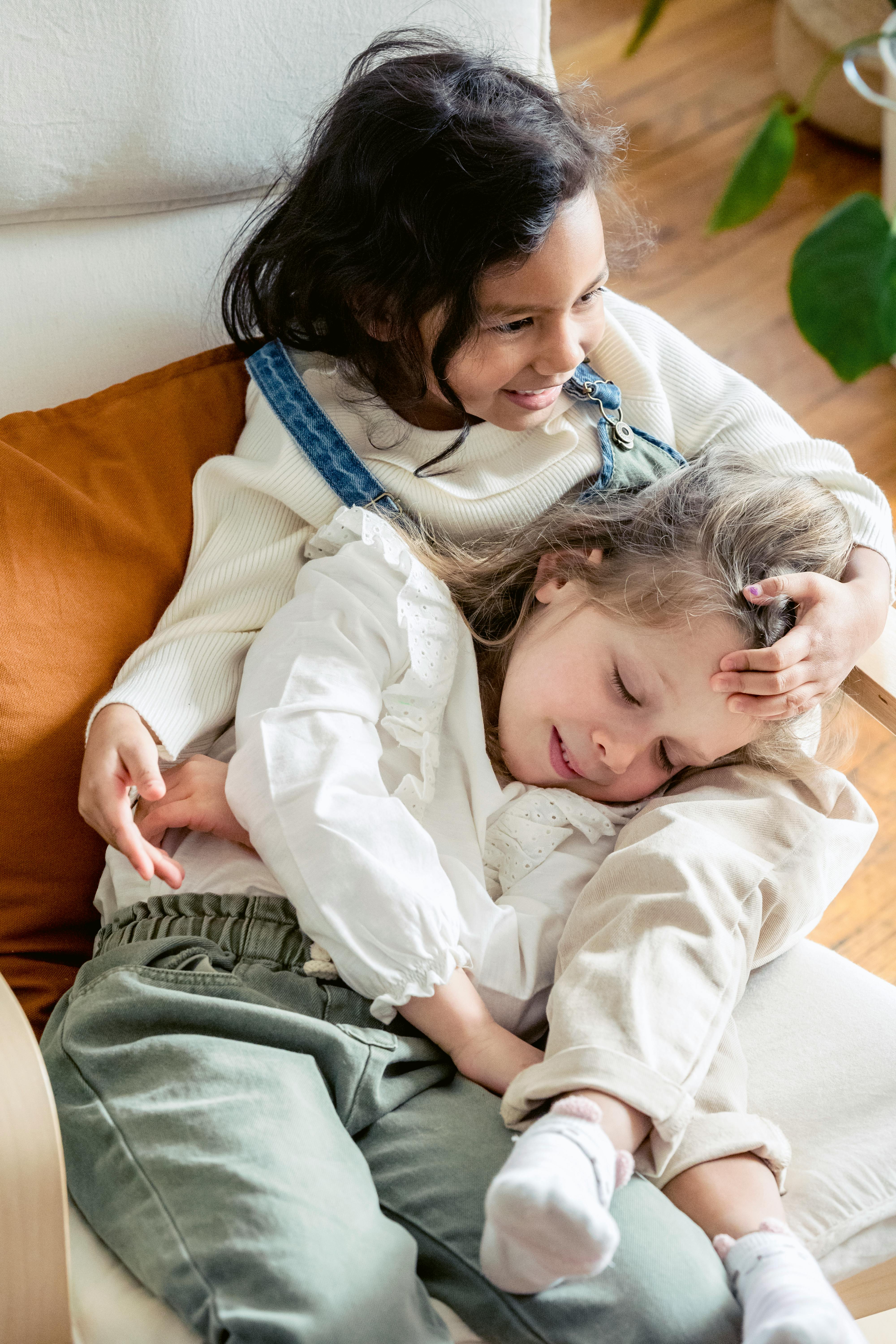 cute children resting on sofa