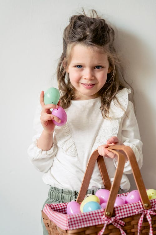 Free Cute girl with Easter eggs Stock Photo