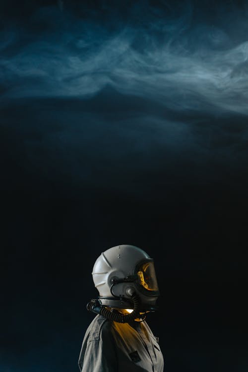 bezplatná Základová fotografie zdarma na téma astronaut, atmosféra, helma Základová fotografie