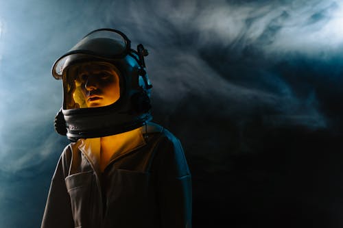 Foto profissional grátis de astronauta, capacete, exploração