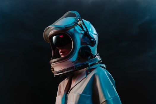 A woman wearing a vintage astronaut helmet and suit, posing in a studio setting.