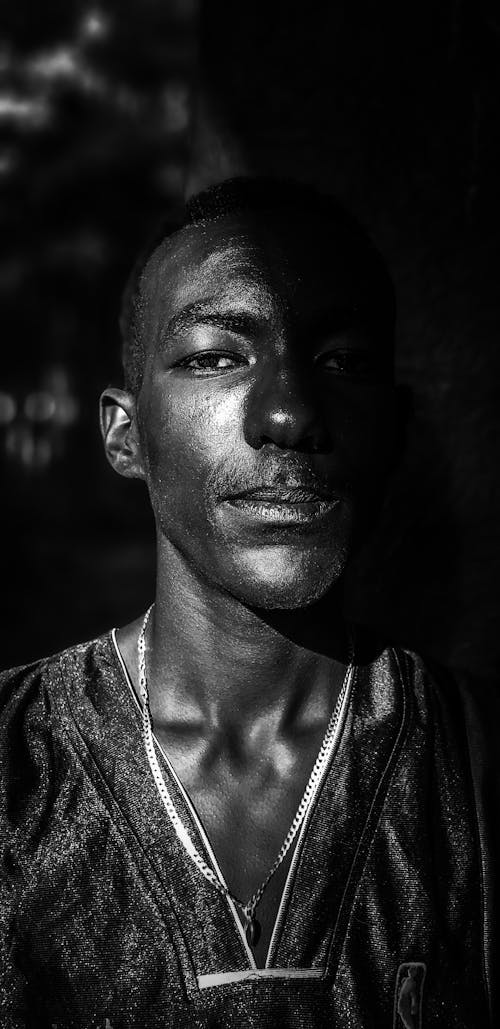 Grayscale Photo of Man in  Jersey Shirt