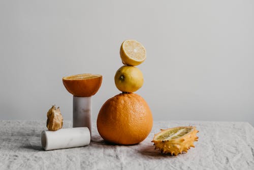 Photo of Candles Near Fruits