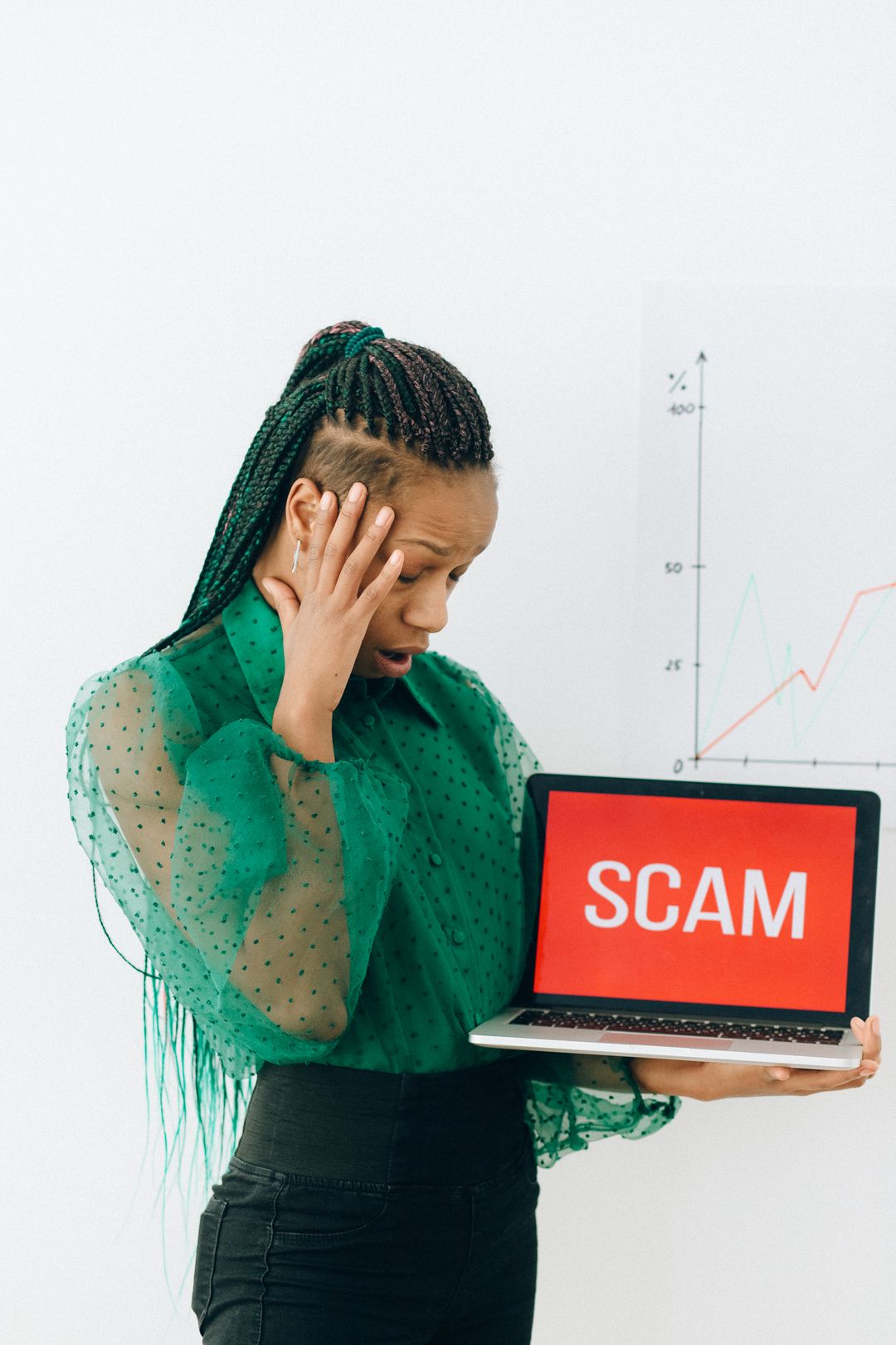 Laptop showing a scam alert during a phishing simulation