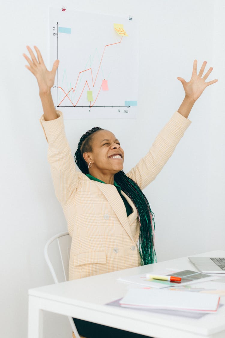 A Woman Celebrating Her Success