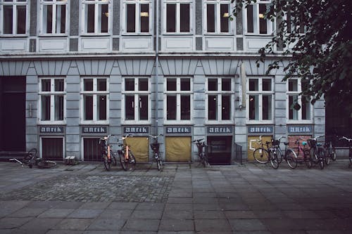 Bicycles Parked in Front of Building