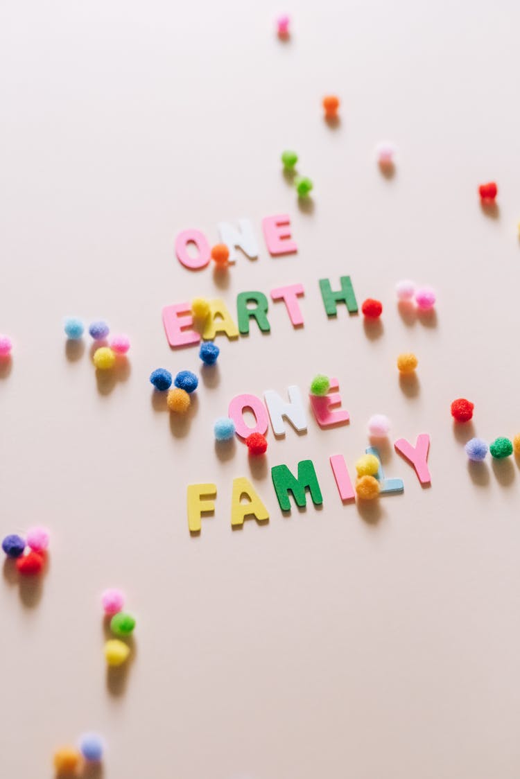 A Save Earth Message In Colorful Letters