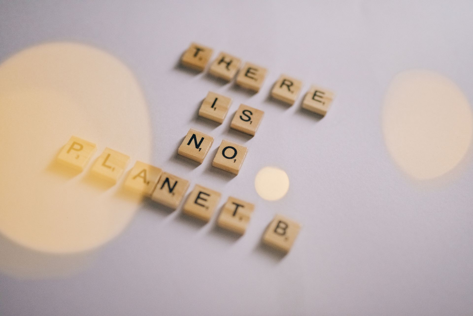 Scrabble Tiles Forming a Save Earth Message