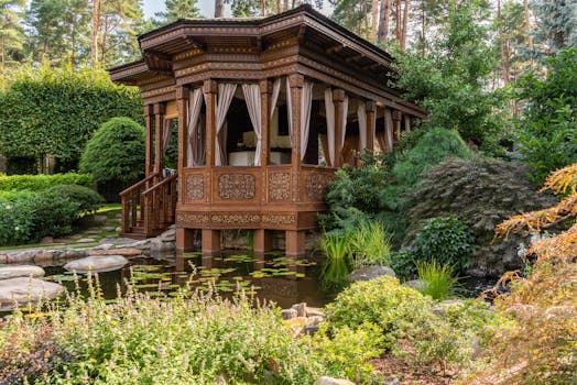 Brown Wooden Gazebo Surrounded by Green Trees and a Pond with the Quote "A brand for a company is like a reputation for a person. You earn reputation by trying to do hard things well." written on it and have average color value #6D6740