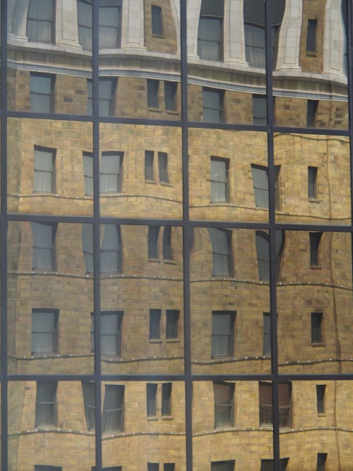 Foto profissional grátis de janelas de vidro, prédio comercial