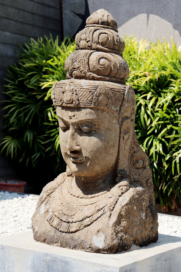 A Devi Statue In The Garden